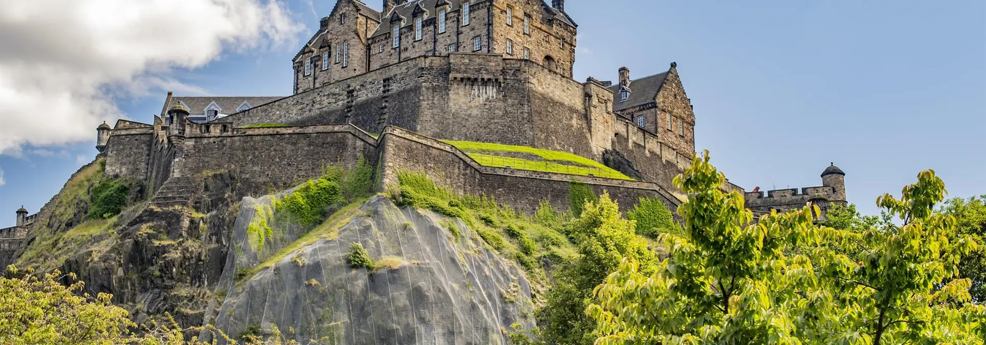 Edinburgh castle on a summer's day with blue sky.