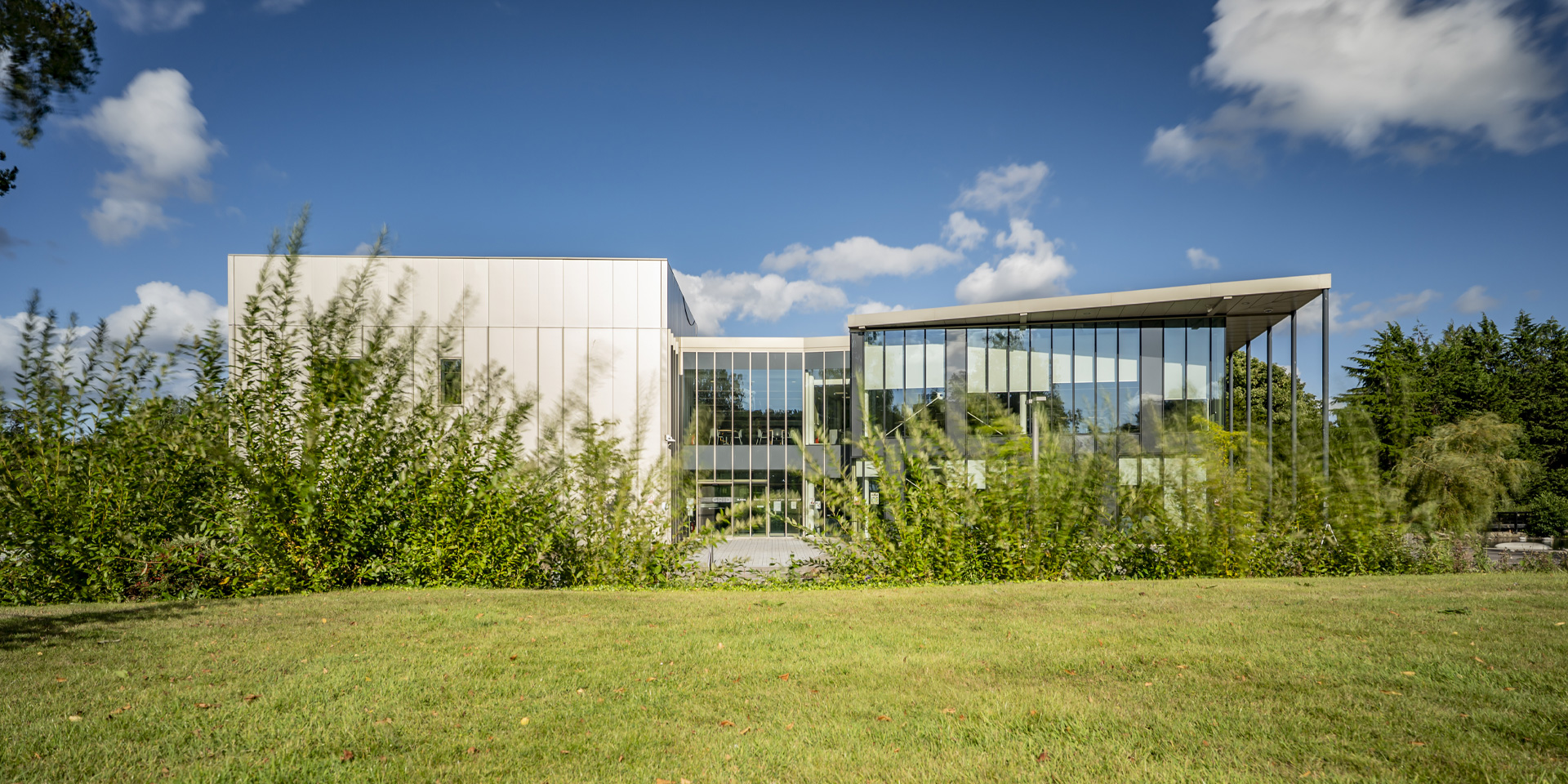 The GRID building with blue sky behind.