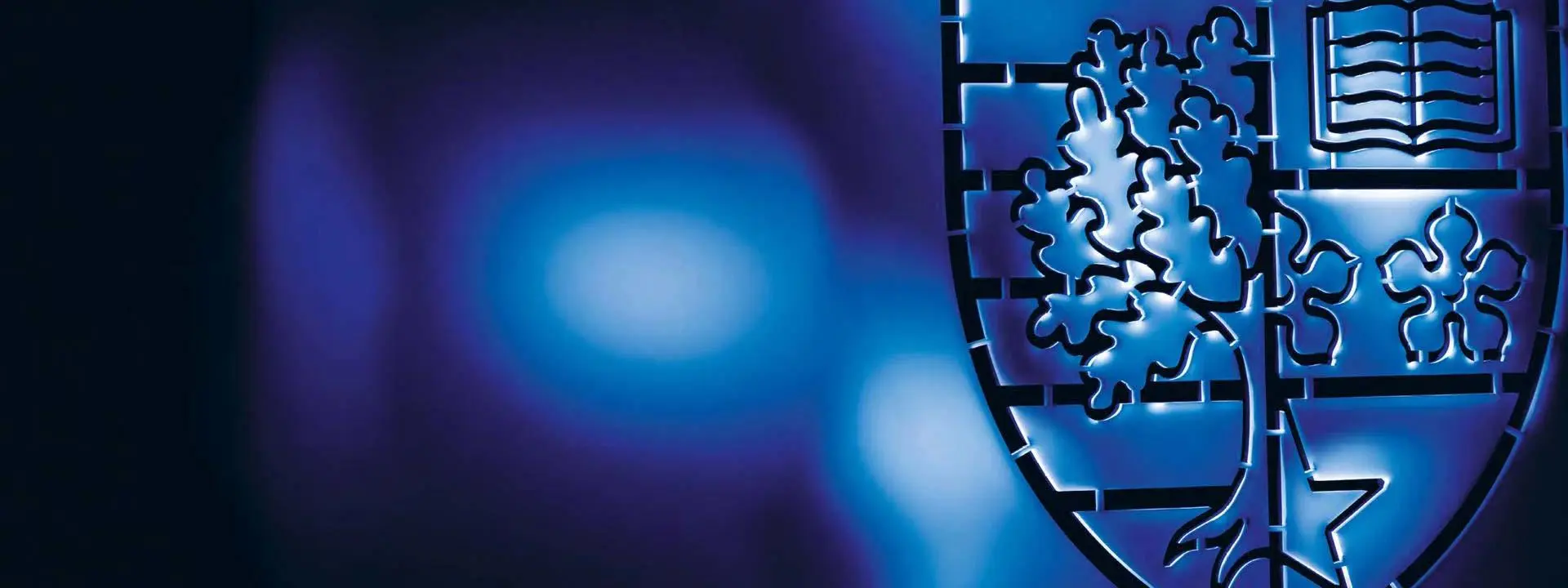 Heriot-Watt shield logo on a blue background