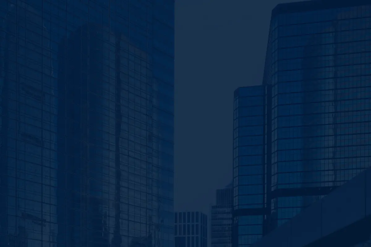 City skyline made up of blue skyscraper buildings.