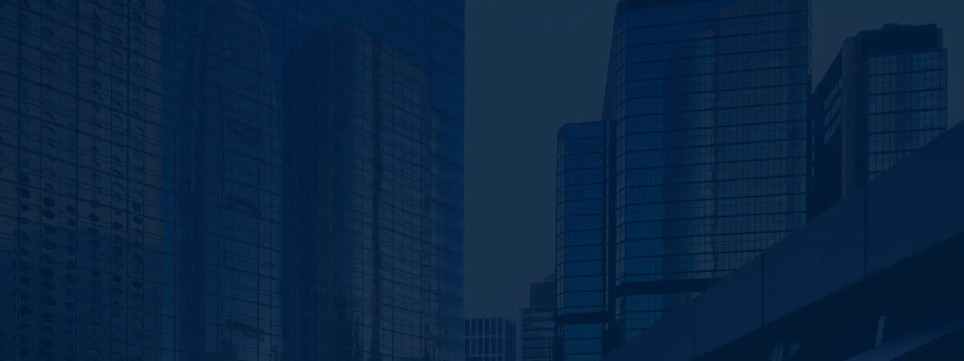 City skyline made up of blue skyscraper buildings.