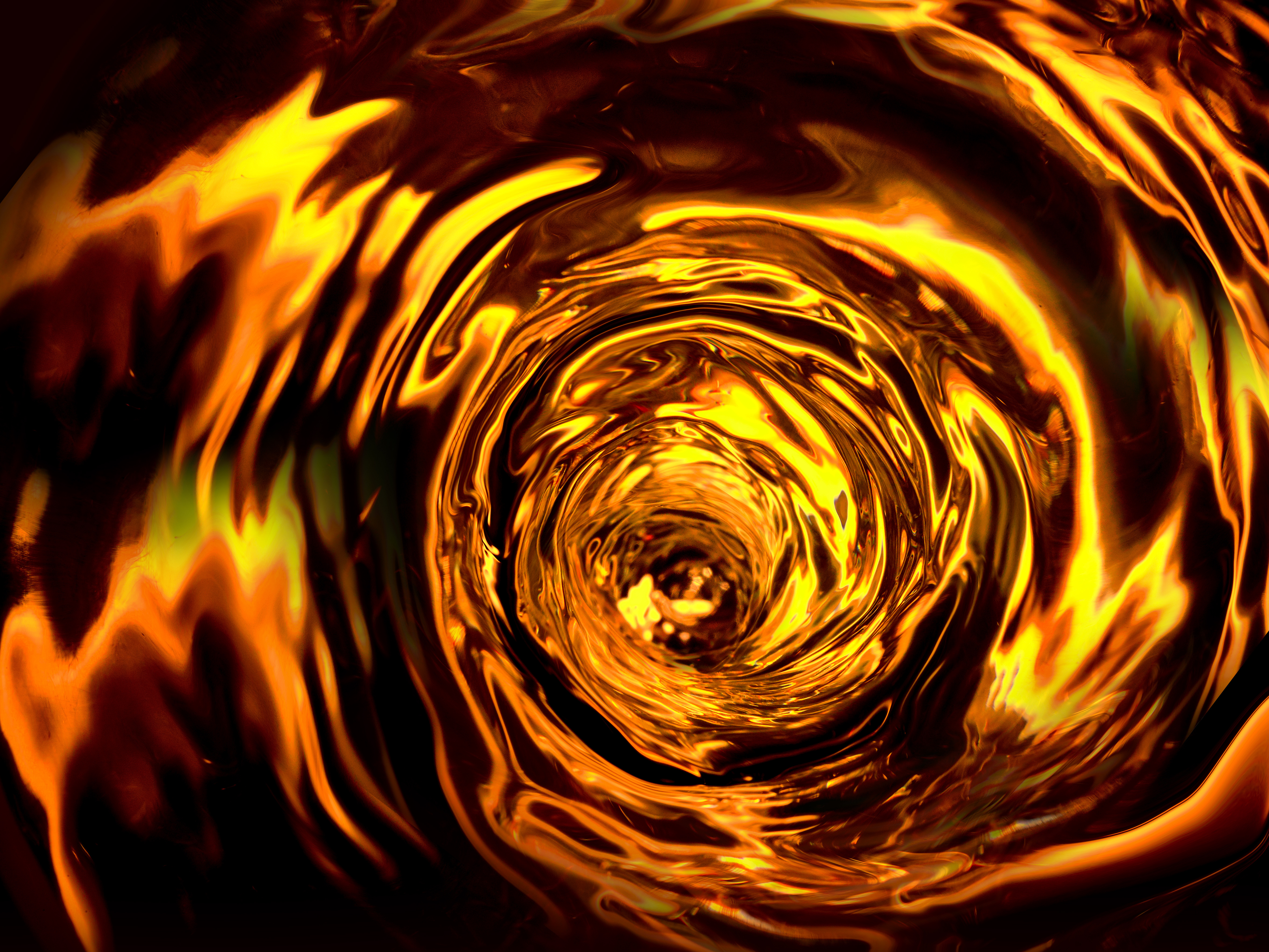 A vortex of amber coloured spirit 