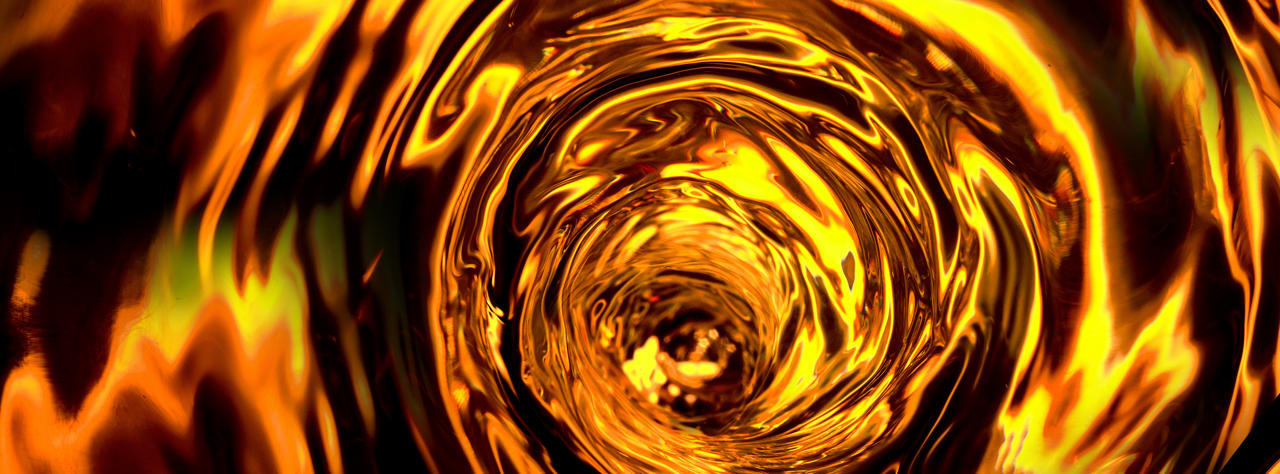A vortex of amber coloured spirit