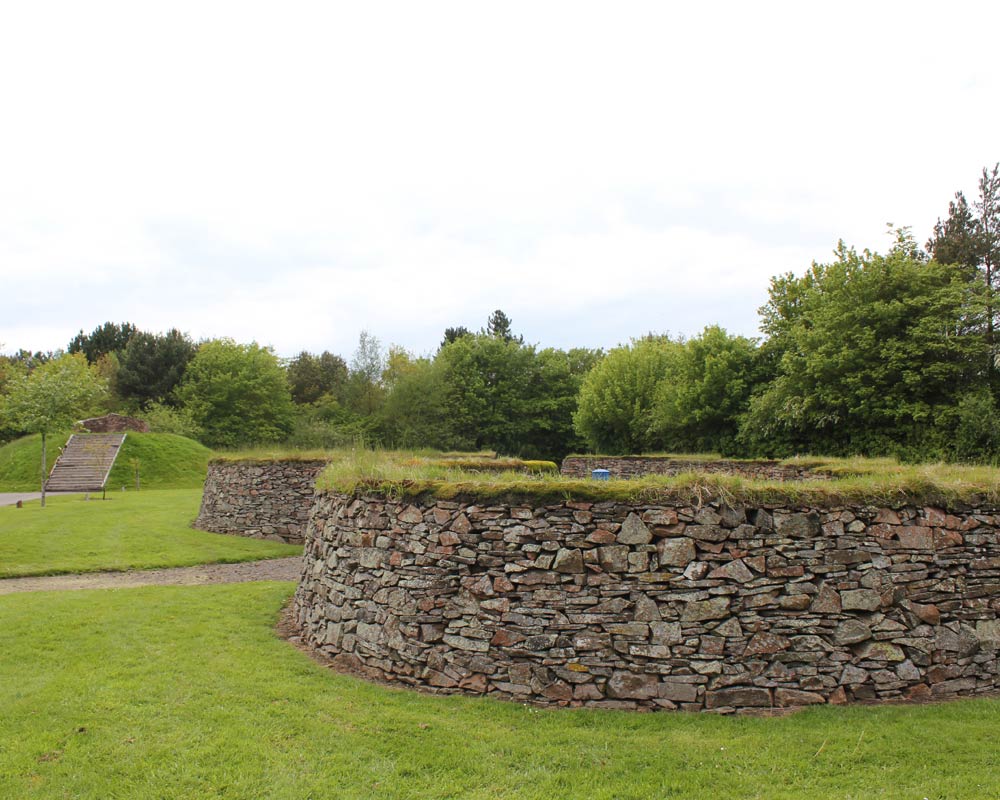 Stone enclosures beside trees