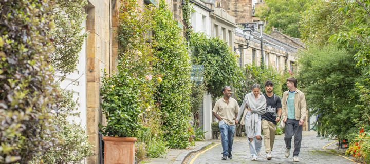 Student chat as the walk along Circus Lane in Edinburgh.