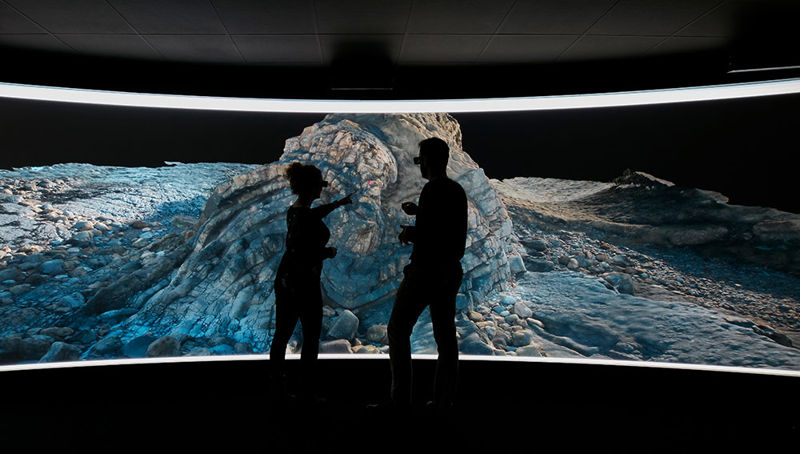 People wearing virtual reality headsets