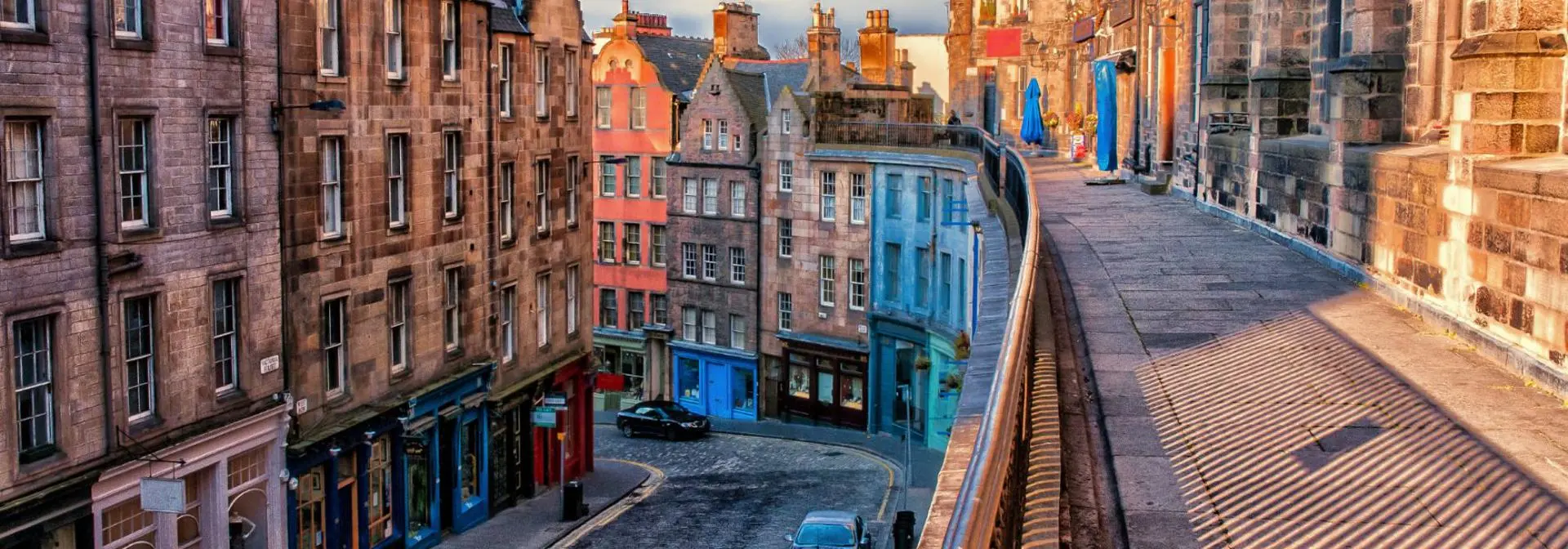 Victoria Street in Edinburgh at sunset with no people.