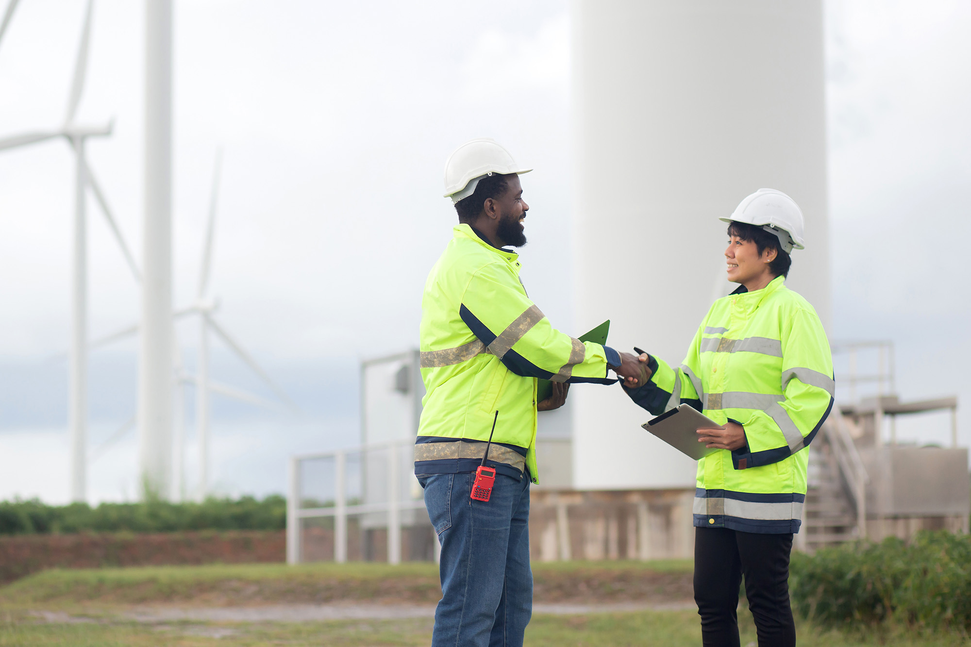 Two engineers at a windfarm