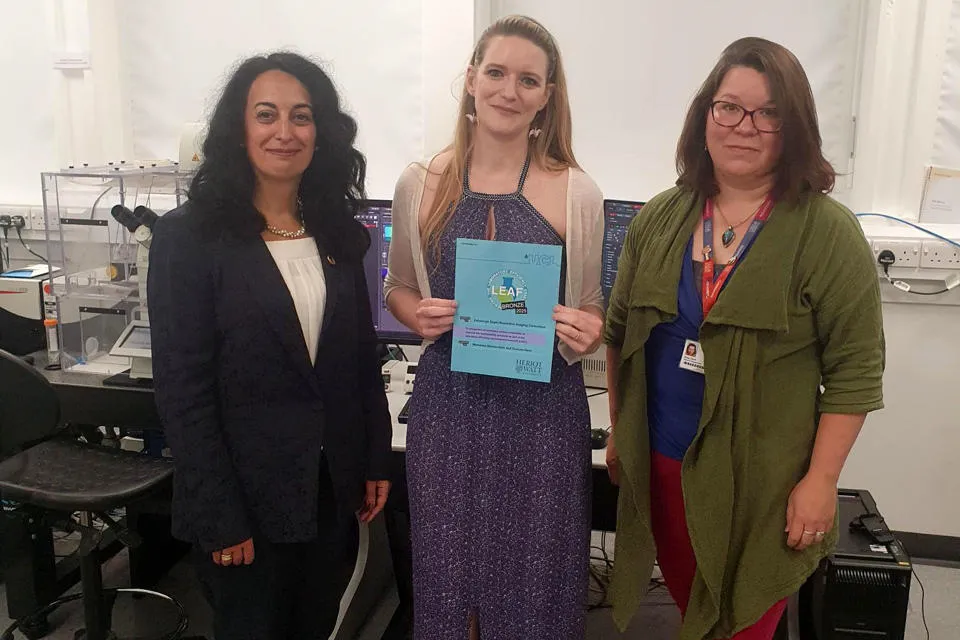 Professor Mercedes Maroto-Valer, Jessica Valli holding the LEAF award, and Anna Clark