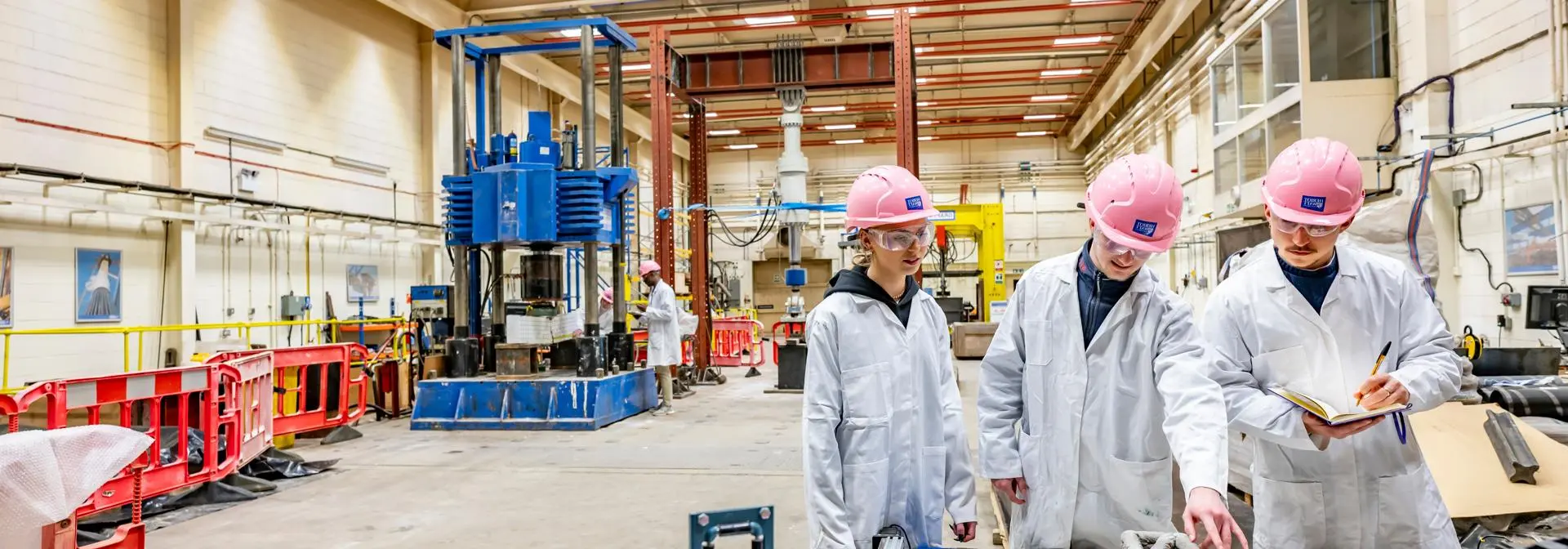 Three students working in the EGIS School at Heriot-Watt.
