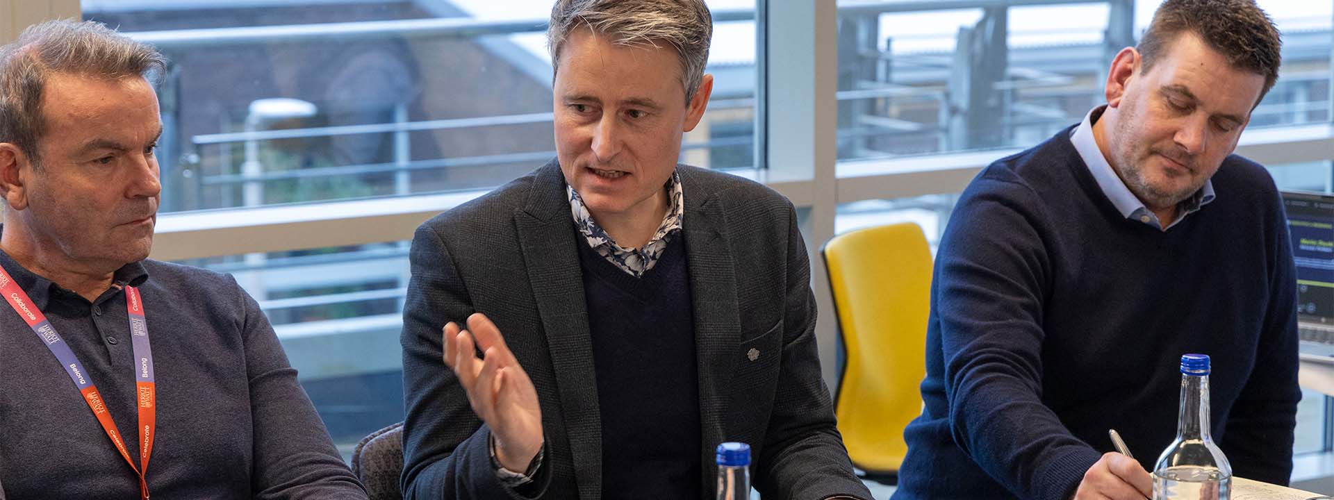 Martin Stucki, Executive in Residence, speaks at meeting.