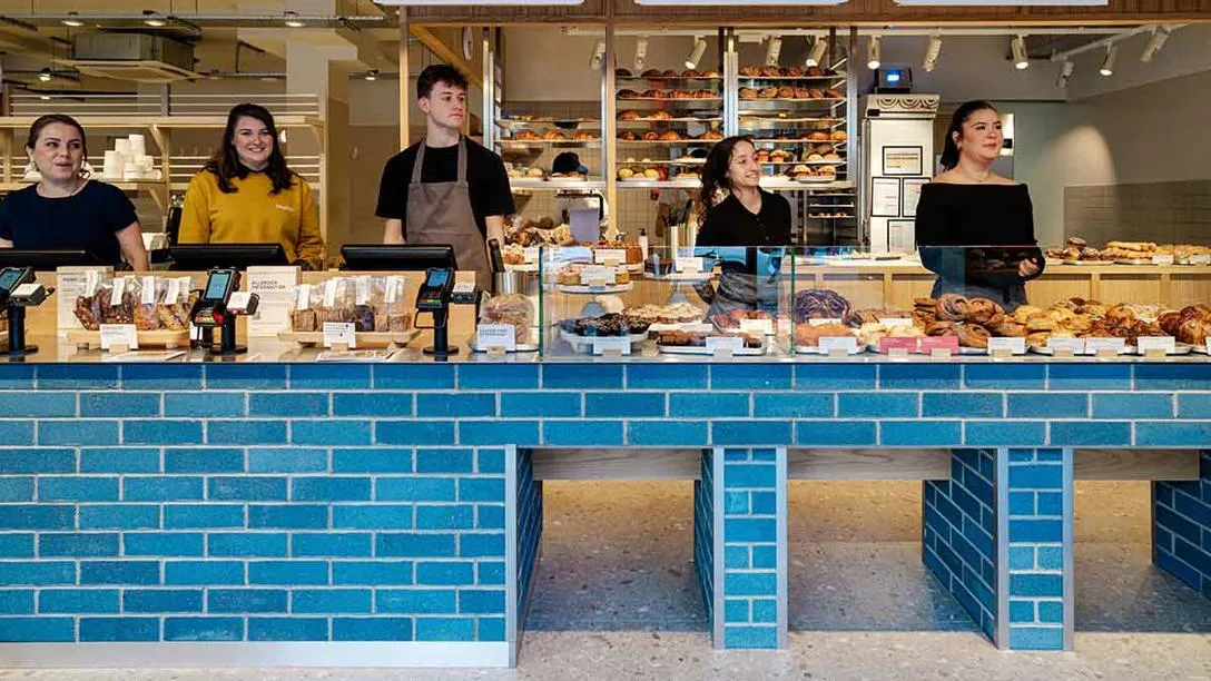 Staff serving at bakery