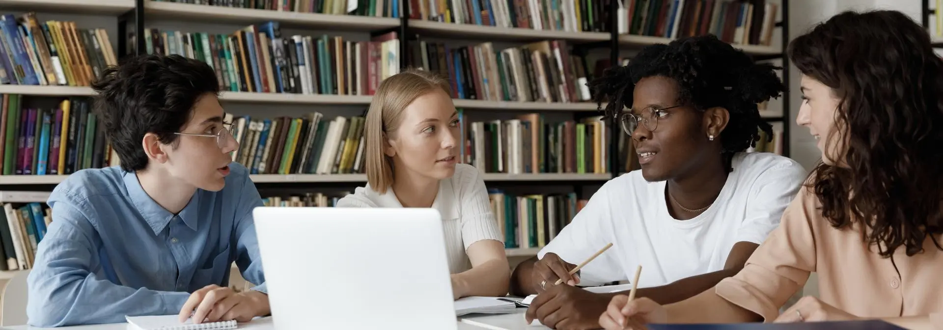 Group of students studying at table