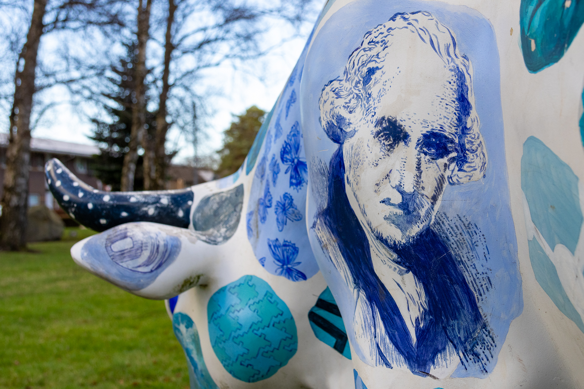 Illustration of James Watt's head on the 'Watt a nice cow' statue at the Edinburgh Campus.