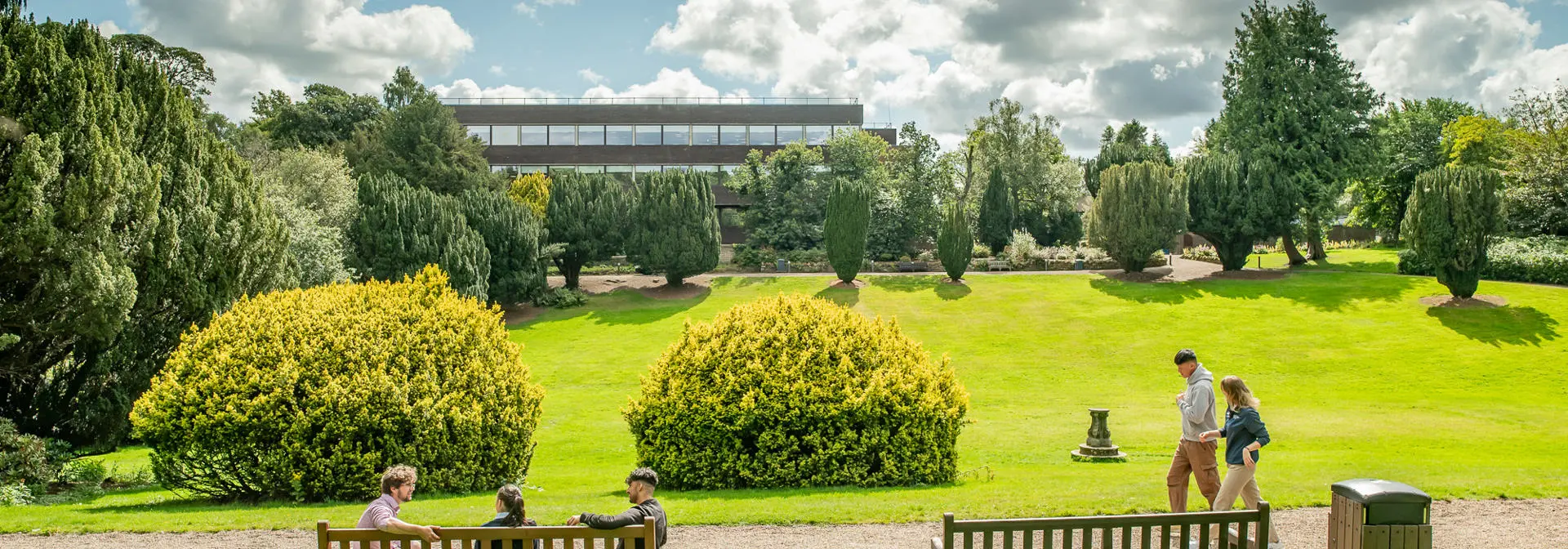 Students in the sunken garden opposite the Cameron Smail Library