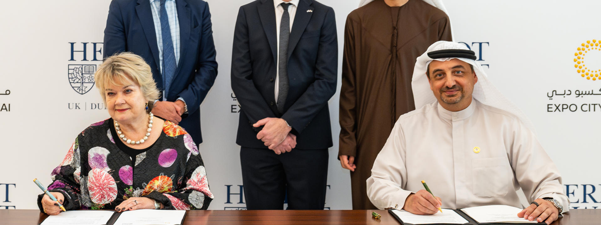 Image shows the key participants at the signing of the MOU in the UAE.