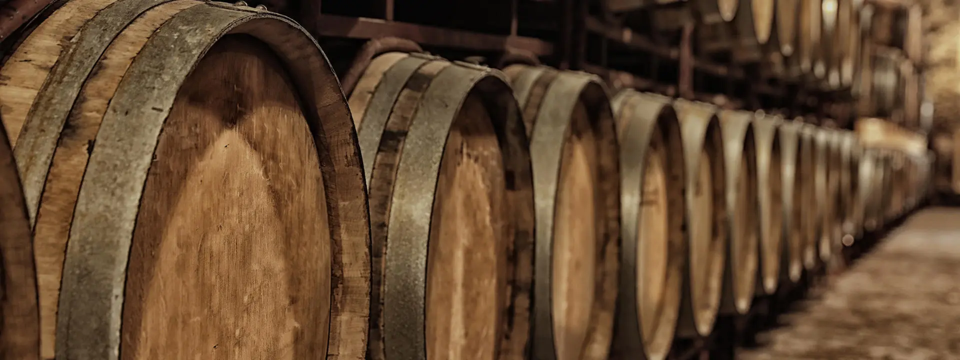 a line of whisky barrels