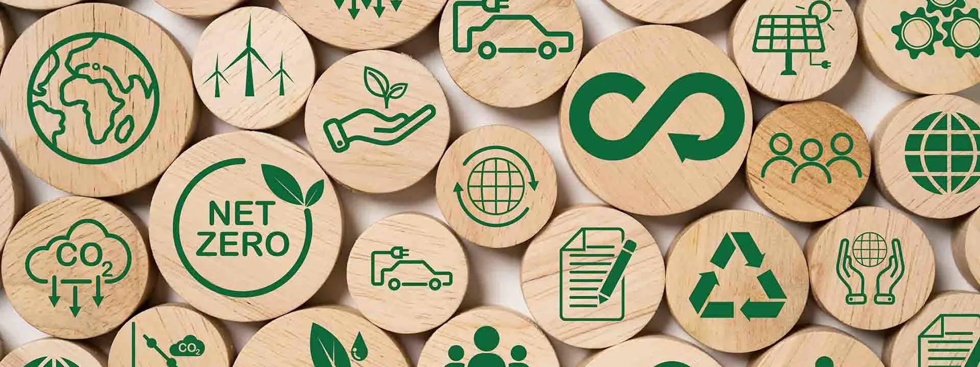 Image shows a selection of images and symbols representing environmental sustainability.