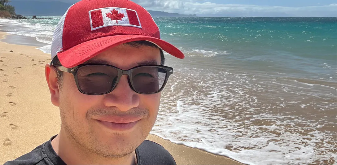 Ethan Wang on a beach in Maui, Hawaii