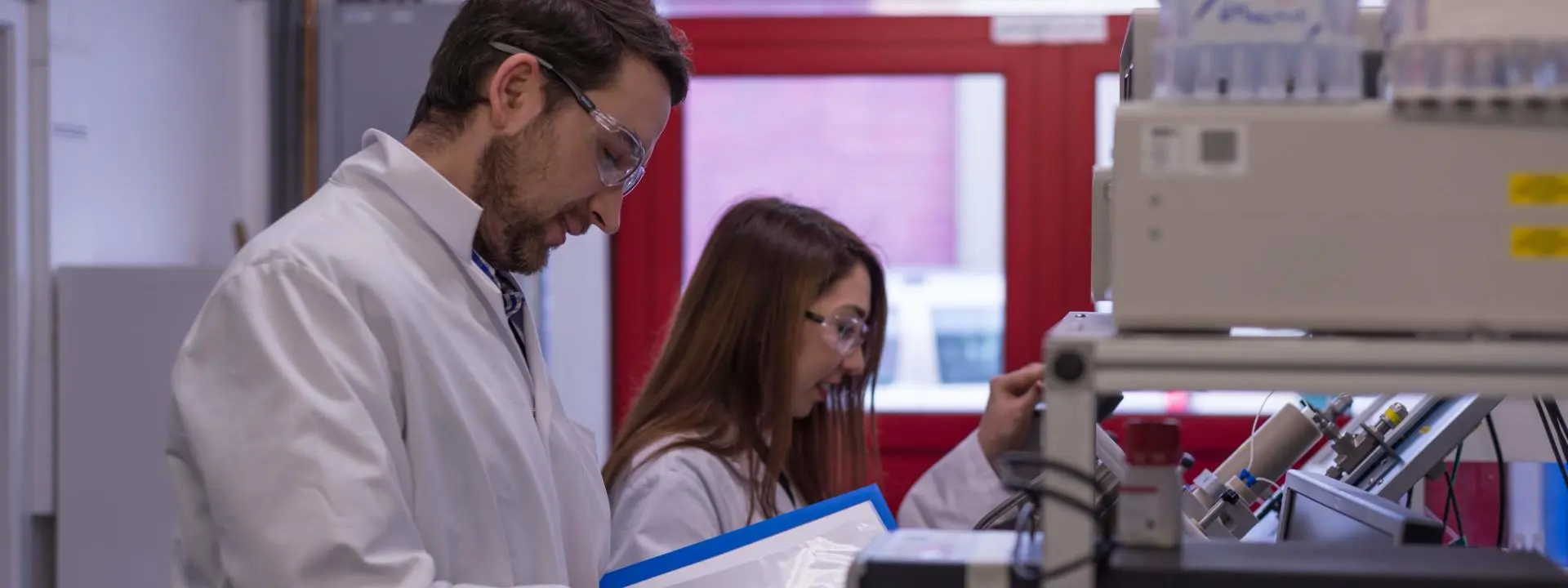 Dr Oleg Ishkov with a colleague (PhD student Alsu Valiakhmetova) at Heriot-Watt University lab (2018).