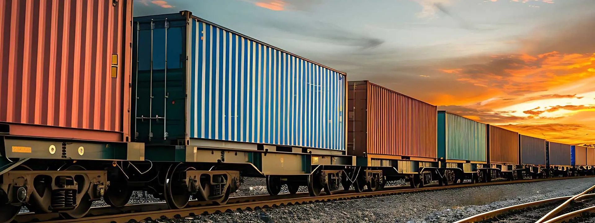 A train carrying numerous containers, transporting goods efficiently across the tracks.
