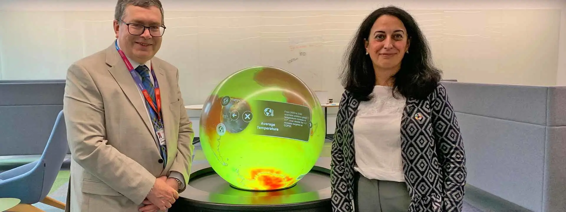 Professor Richard A. Williams (left) and Professor Mercedes Maroto-Valer stand either side of a thermal globe.