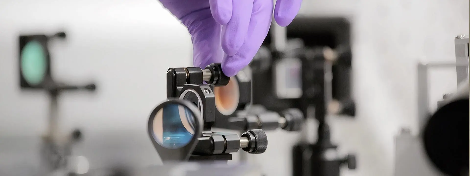 Scientists work with lasers in one of the Renishaw collaboration projects.