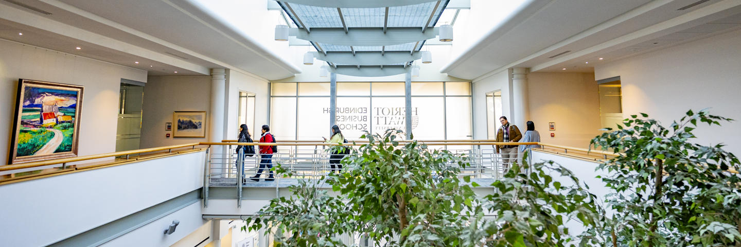EBS atrium with students walking on an upper walkway.
