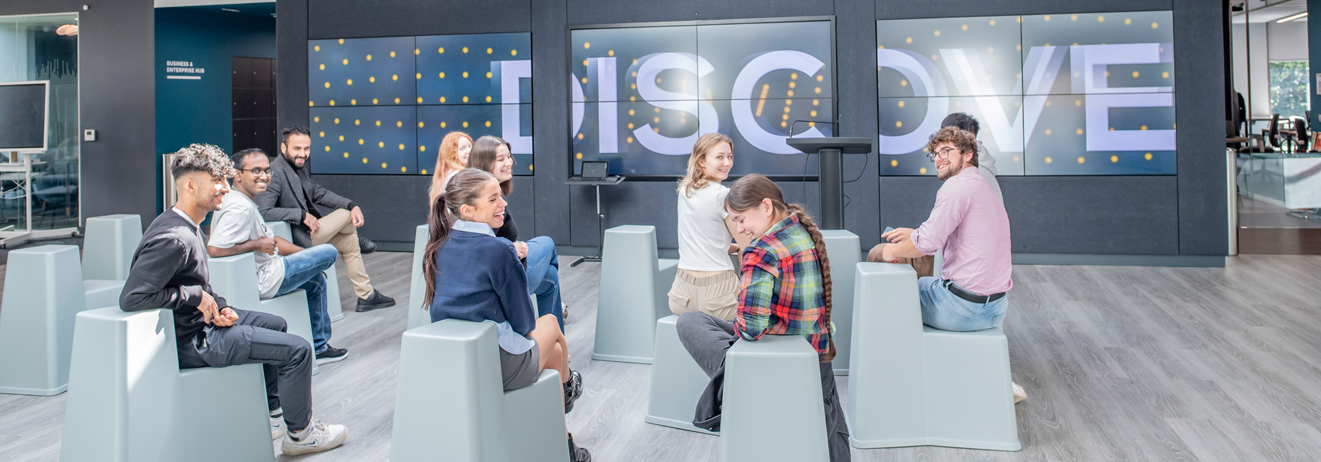 A group of students smiling and enjoying an event.