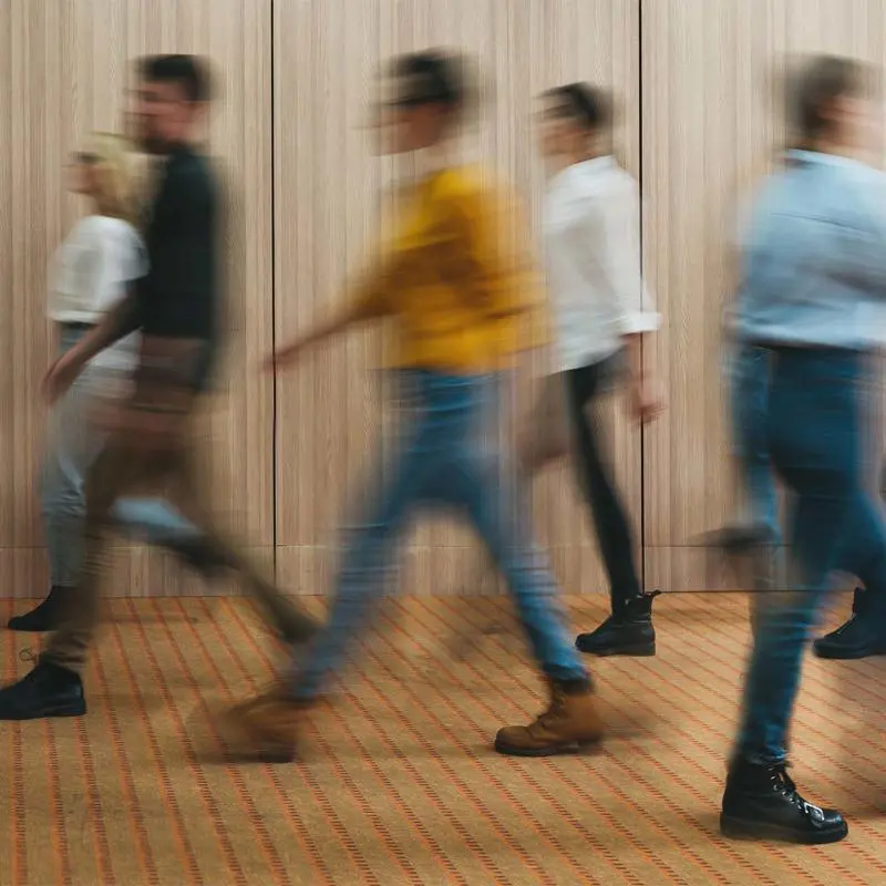 People walking in an office building