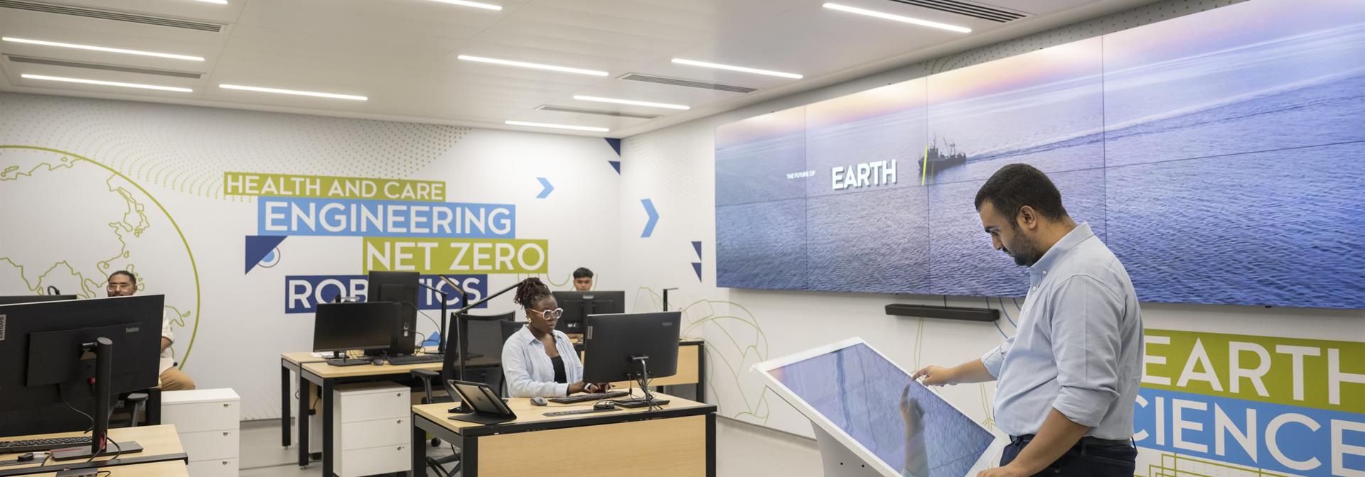 Dubai energy and renewables study room with students on computers