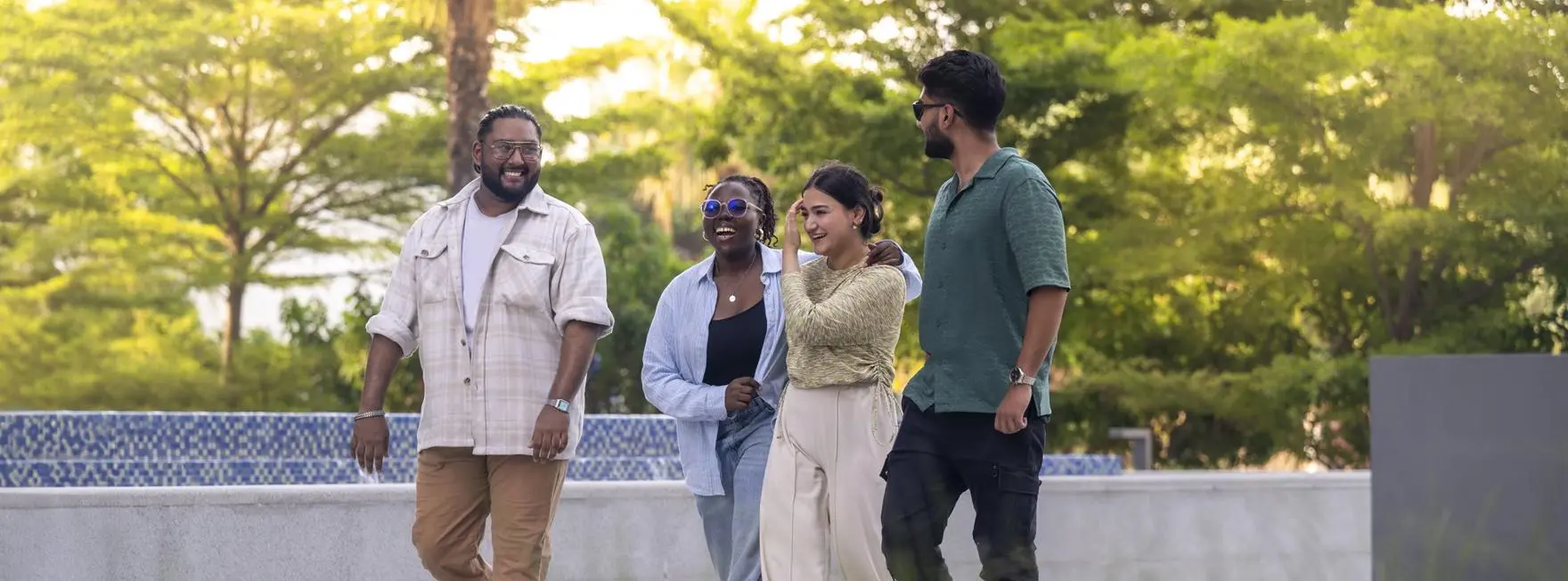 Students in Dubai walking outside on campus