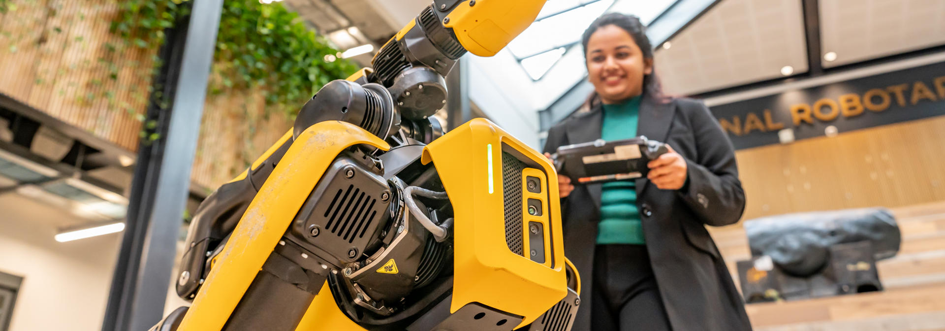 Robot controlled by a student with a remote control