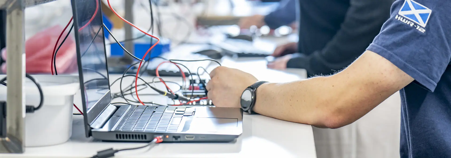 Student working on digital equipment