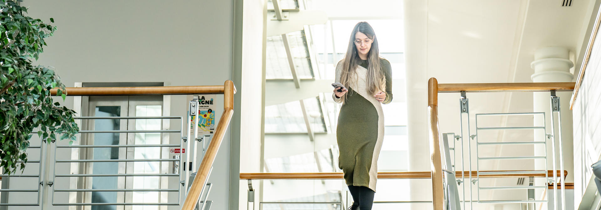 Student walking down the stairs