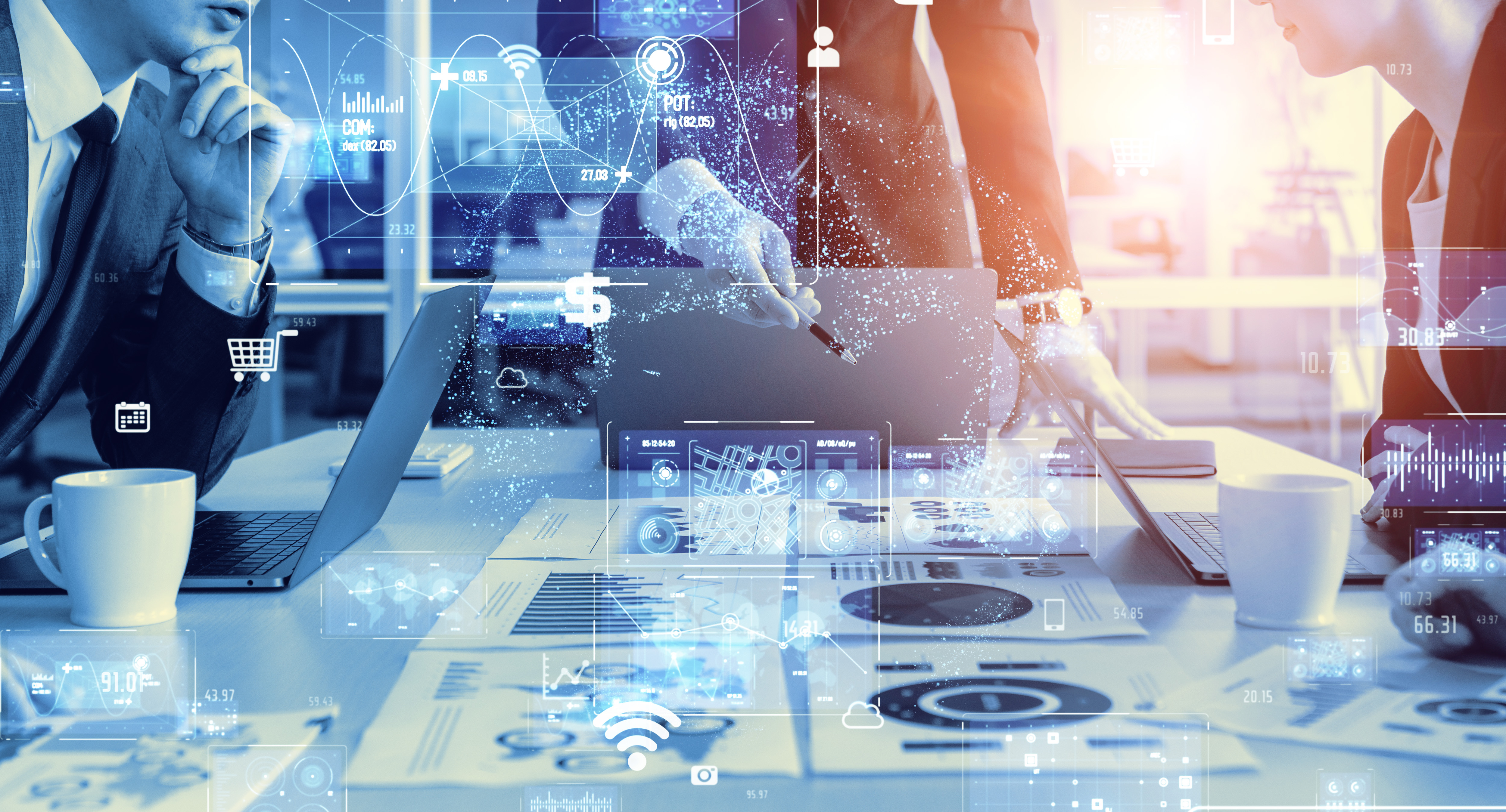 consultants discussing charts in a meeting