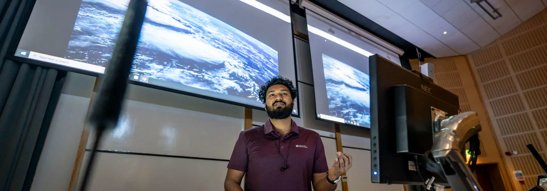 A lecturer addresses a classroom