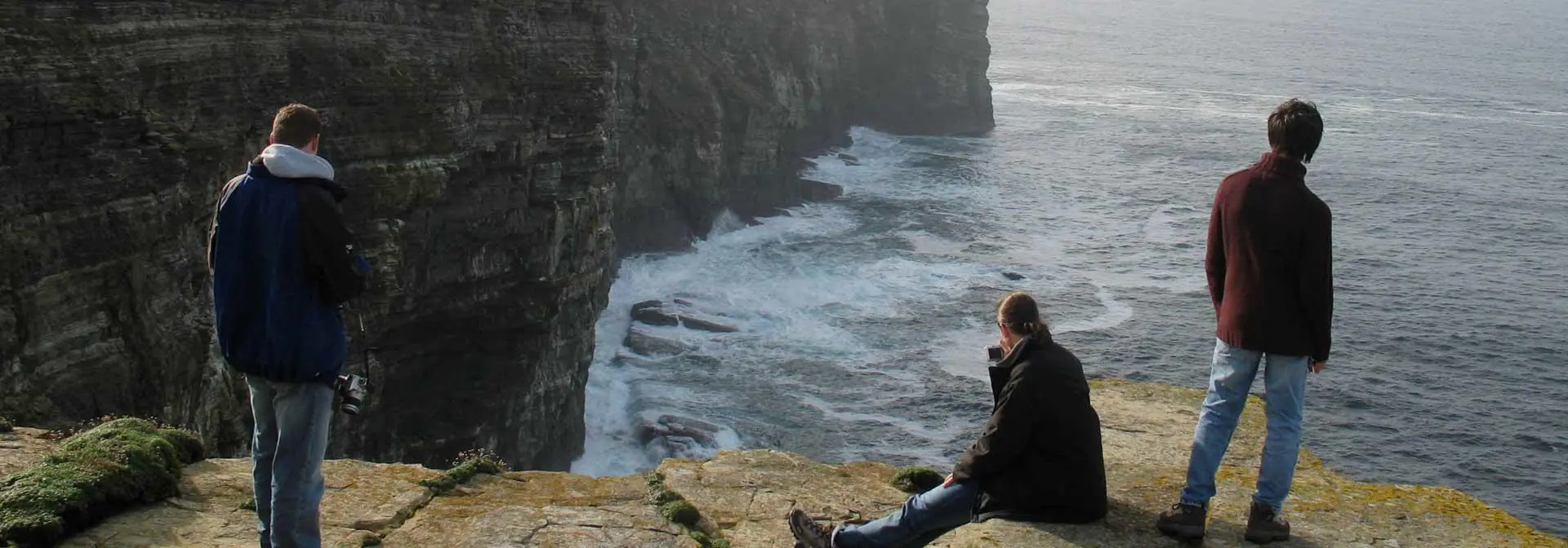 students-cliff-sea