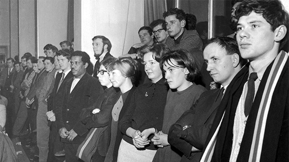 A group of students watch the Royal Charter award ceremony Royal Charter Students