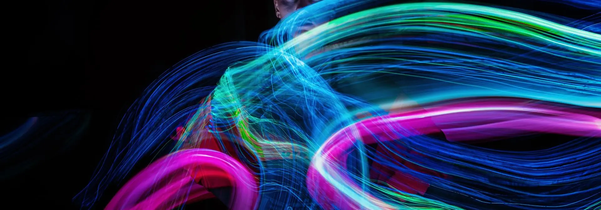 Abstract image of light flares over a female model