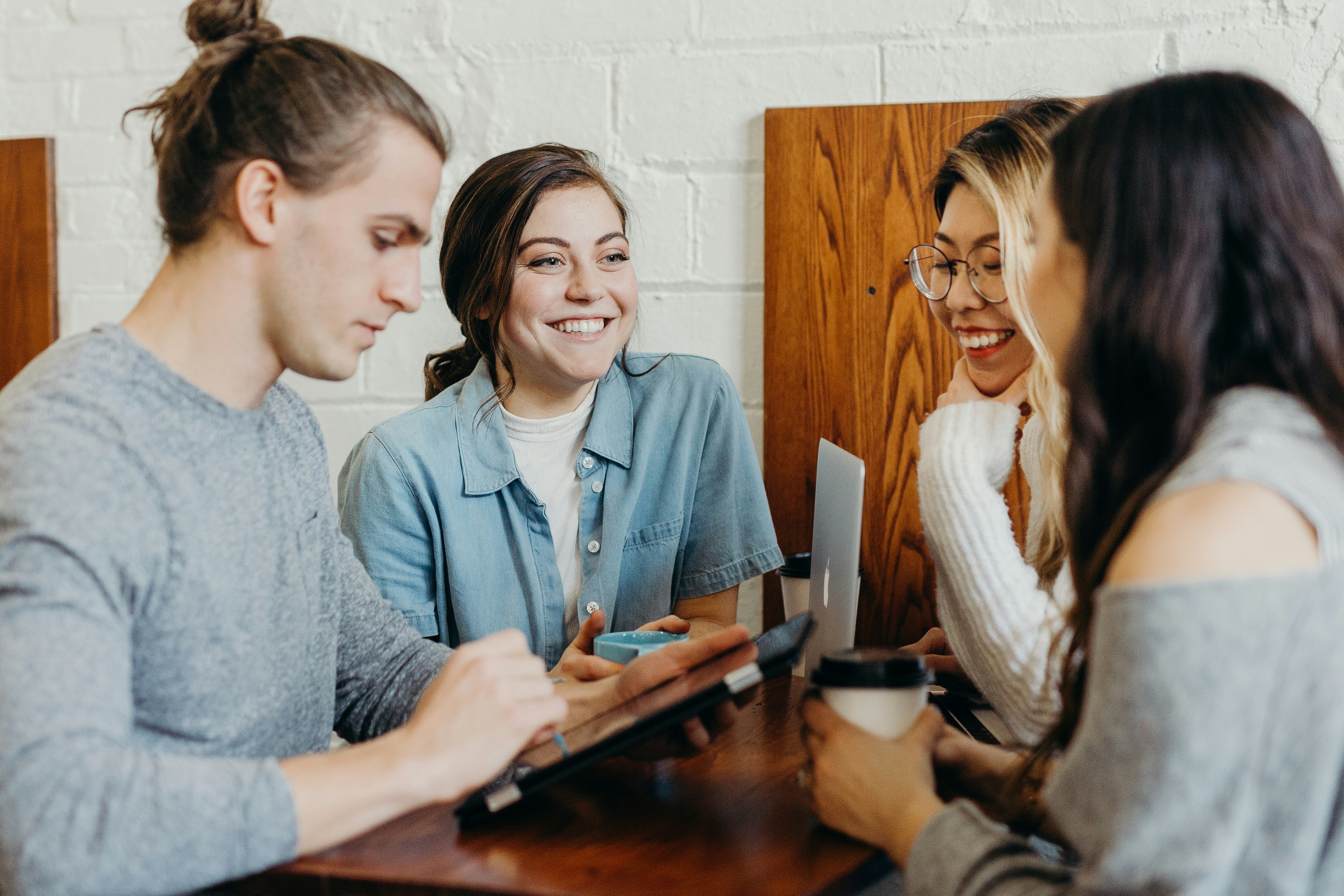 A group of students sitting around a table