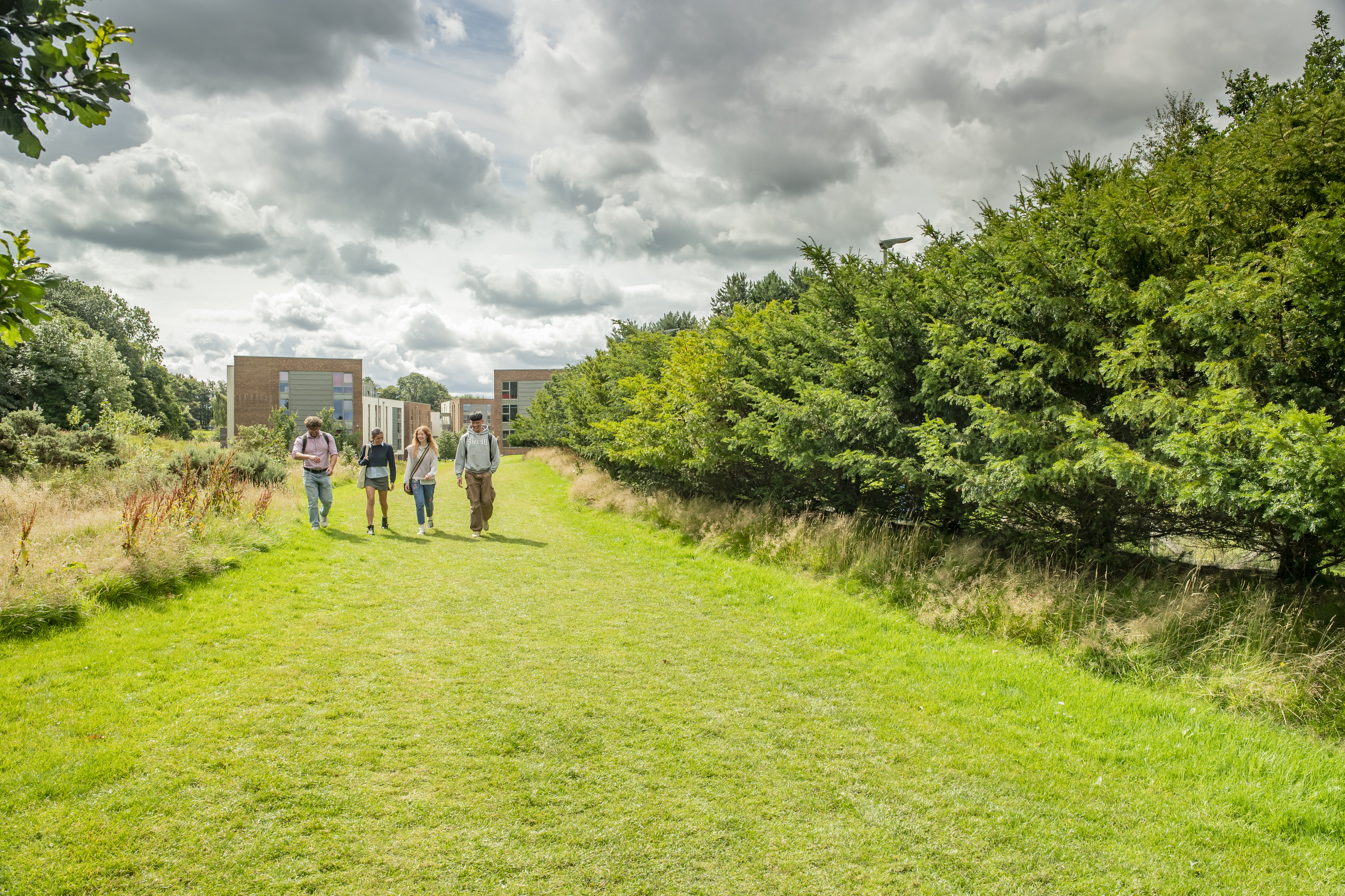 A group of students leaving the student village (halls of accommodation)