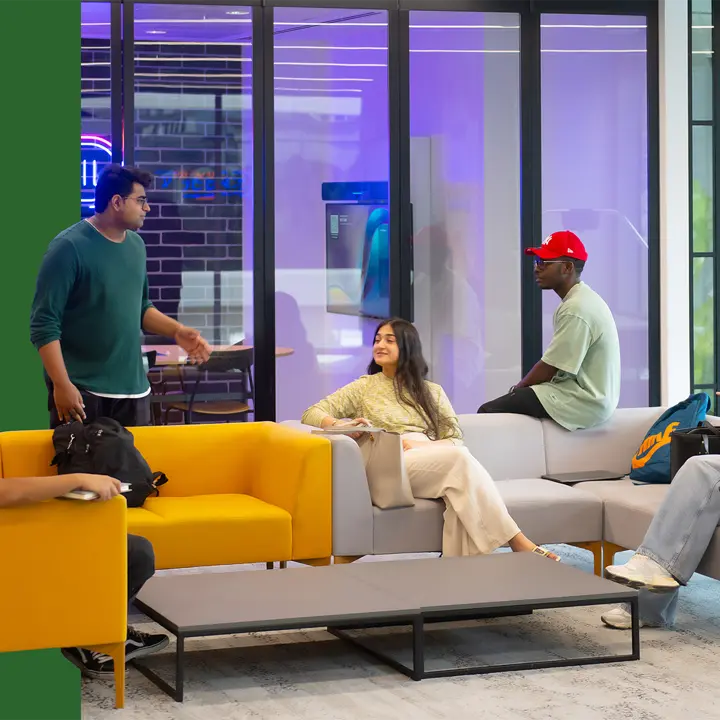 students sitting on sofa and socialising