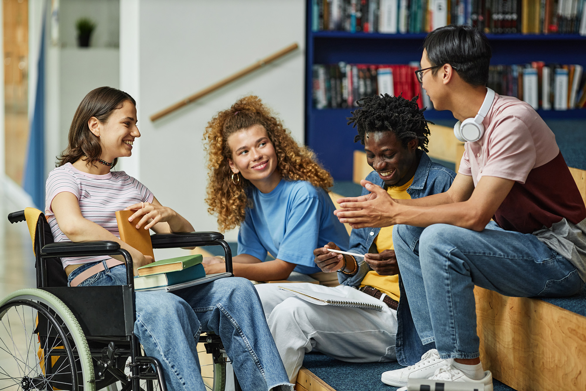 Four students in the library.