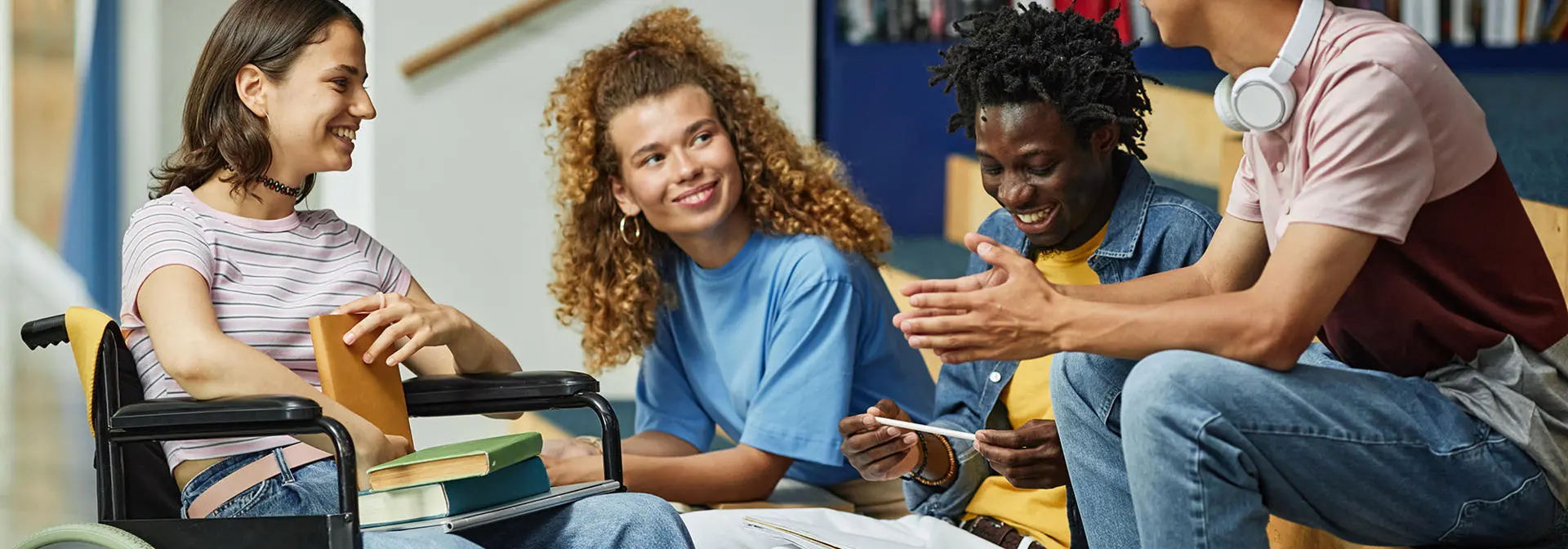 Four students in the library.