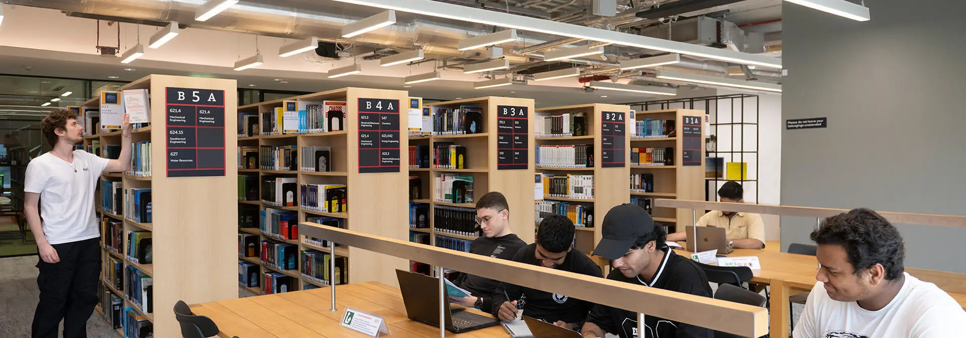 Students working in the Dubai campus library.