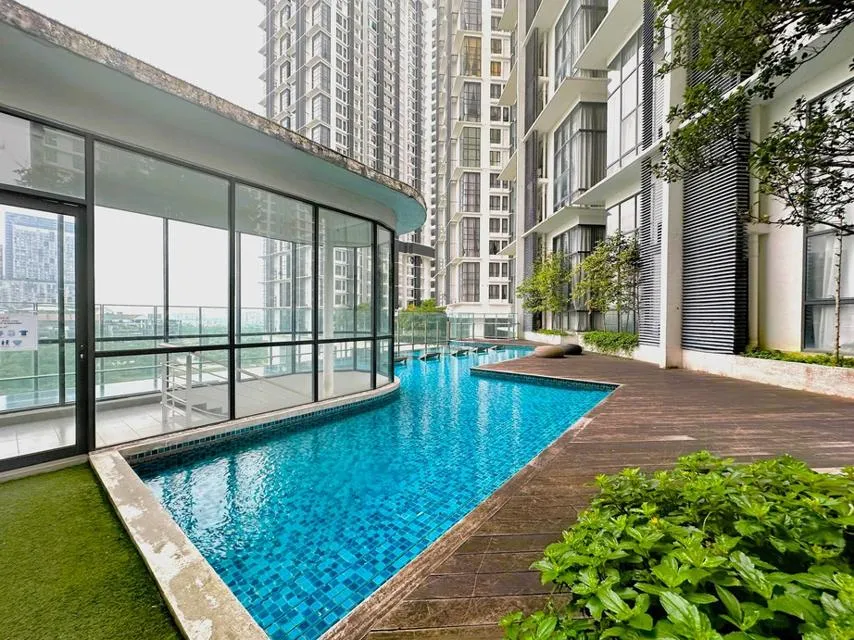 Swimming pool with buildings in background