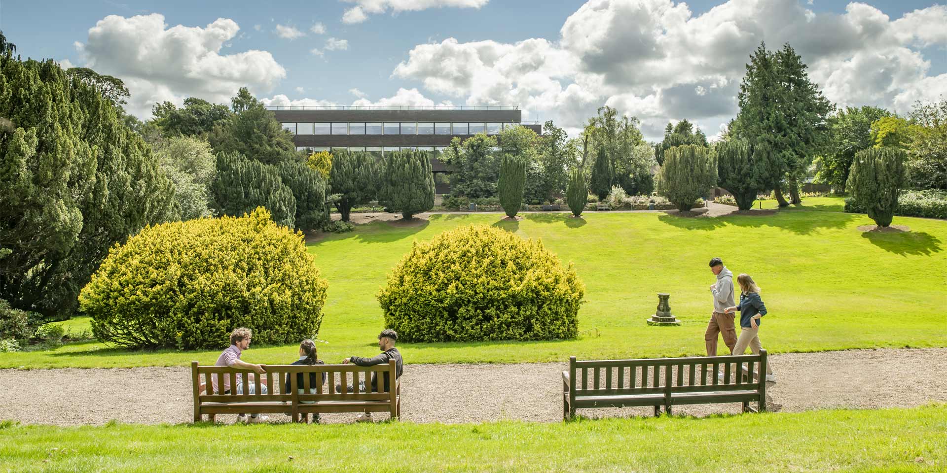 Students chat as the walk through the campus grounds.