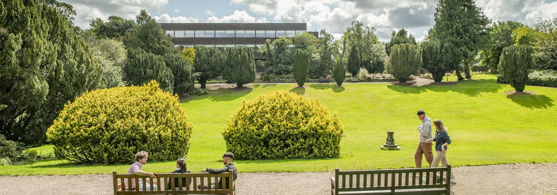 Students chat as the walk through the campus grounds.