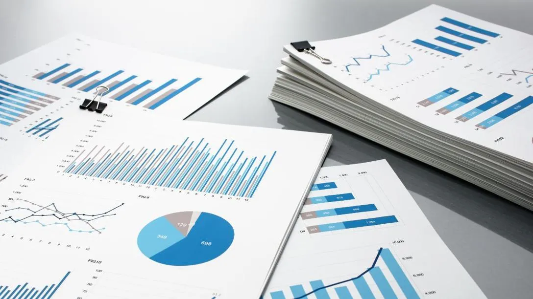 Paper showing pie charts, line graphs and bar graphs